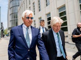 Hall of Fame trainer Bob Baffert (left), shown here leaving federal court during a Monday hearing, had his indefinite suspension by the New York Racing Association ruled unconstitutional. A Brooklyn judge said the suspension violated the trainer's due process rights. (Image: AP File Photo/John Minchillo)