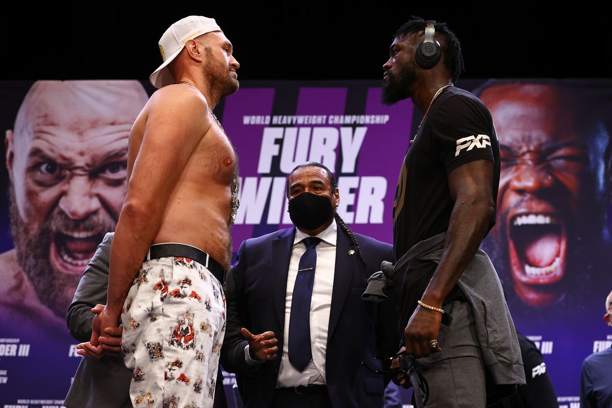 Tyson Fury Deontay Wilder COVID-19