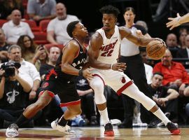 Miami Heatâ€™s Jimmy Butler is defended by Kyle Lowry from the Toronto Raptors during a game in early 2020. (Image: Michael Reaves/Getty)