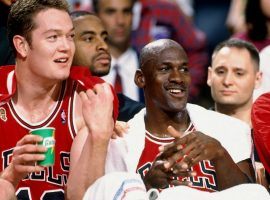 Luc Longley with Michael Jordan on the Chicago Bulls bench in 1996. (Image: Getty)