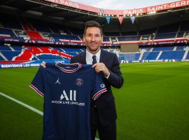 Messi took his first picture with the PSG shirt after signing his two-year deal at Parc des Princes. (Image: Twitter/PSGinside)