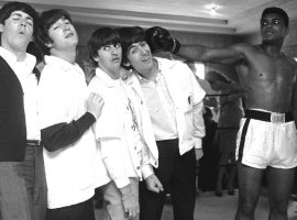 The Beatles visit Muhammad Ali at his training gym during a trip to Miami in 1964. (Image: AP)