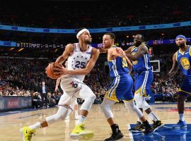 Ben Simmons from the Philadelphia 76ers drives the lane against Steph Curry of the Golden State Warriors, but team owner Joe Lacob dismissed any Simmons trade rumors. (Image: Getty)