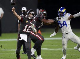 Tampa Bay Bucs QB Tom Brady in the pocket during a loss against the Los Angeles Rams, but the Bucs are the new favorite to win the Super Bowl. (Image: Jason Behnken/AP)