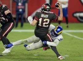 Samson Ebukam from the Los Angeles Rams sacks Tom Brady of the Tampa Bay Bucs in Week 3 at SoFi Stadium in LA. (Image: Jason Behnken/AP)