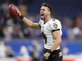 Justin tucker from the Baltimore Ravens celebrates a game-winning and record-setting 66-yard field goal on Sunday at Ford Field in Detroit. (Image: Raj Mehta/USA Today Sports)