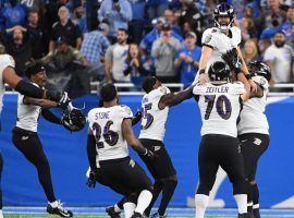 Baltimore Ravens kicker Justin Tucker is hoisted by his teammates after he defeated the Detroit Lions with a record-setting field goal at Ford Field in Detroit. (Image: Getty)