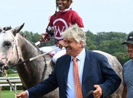 A beaming Steve Asmussen escorts Stellar Tap and Ricardo Santana Jr. to the Saratoga winner's circle after the juvenile made the conditioner the winningest trainer in North American history. Stellar Tap is the 3/1 morning-line favorite to win the Grade 3 Iroquois Stakes at Churchill Downs. (Image: Chelsea Durand/Coglianese Photos)