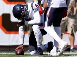 Houston Texans quarterback Tyrod Taylor grimaces in pain after his touchdown run against the Cleveland Browns. (Image: Greg Shamus/Getty)