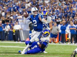 Indy Colts QB Carson Wentz cannot escape Aaron Donald from the LA Rams. (Image: Trevor Ruszkowski/USA Today Sports)