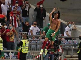 Ronaldo celebrated by taking of his shirt and jumping after overtaking Ali Daei's record of international goals. (Image: record.pt)