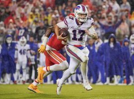 Buffalo Bills quarterback Josh Allen scrambles for a first down against the Kansas City Chiefs during a rain-slogged Sunday Night Football matchup. (Image: Peter Carini/Getty)