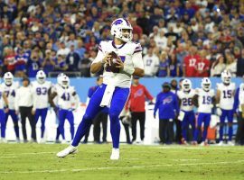 Josh Allen from the Buffalo Bills surveys the Tennessee Titans defense on Monday Night Football. (Image: Getty)