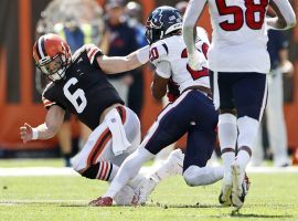 Cleveland Browns quarterback Baker Mayfield fails to tackle Justin Reid from the Houston Texans after an interception in Week 2. (Image: Ron Schwane/AP)