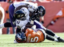 Teddy Bridgewater of the Denver Broncos hits the turf in the second quarter against the Baltimore Ravens, and did not finish the game due to a head injury and concussion. (Image: AAron Ontiveroz/Getty)