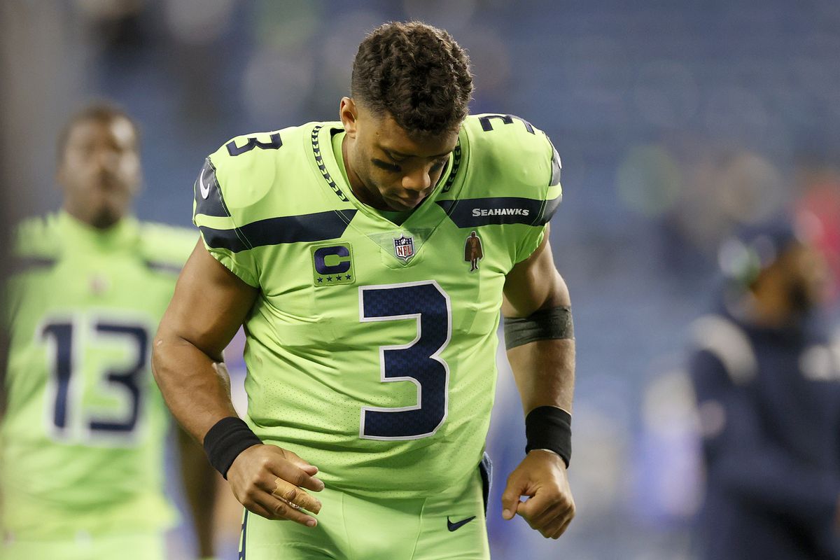 Russell Wilson surgery injury out Seattle Seahawks Geno Smith QB