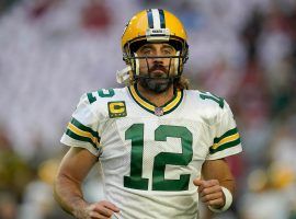 Green Bay Packers quarterback Aaron Rodgers will miss this week’s upcoming game against the Kansas City Chiefs due to a positive COVID-19 test. (Image: Darryl Webb/AP)