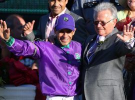 Trainer Art Sherman (right) and California Chrome's jockey Victor Espinoza greet fans after winning the 2014 Kentucky Derby. The 84-year-old Sherman will retire at year's end. (Image: Andy Lyon/Getty Images)