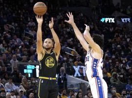 Steph Curry from the Golden State Warriors shoots a 3-pointer over Furkan Korkmaz of the Philadelphia 76ers. (Image: Getty)