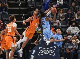Ja Morant from the Memphis Grizzlies makes an acrobatic drive to the basket against the Phoenix Suns at the FedEx Forum in Memphis. (Image: Getty)