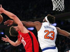 Houston Rockets big man Alperen Sengun gets his shot stuffed by Mitchell Robinson from the New York Knicks at MSG in New York City. (Image: Noah K. Murray/AP)