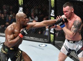 Kamaru Usman (left) outpointed Colby Covington (right) over five rounds to retain his welterweight title on Saturday night. (Image: Jeff Bottari/Zuffa)