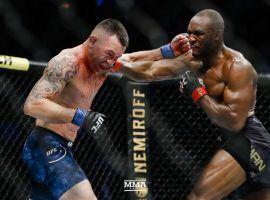 Colby Covington (left) will take a second shot at Kamaru Usman (right) in a rematch for the welterweight title at UFC 268 on Saturday. (Image: Esther Lin/MMA Fighting)