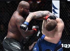 Derrick Lewis (left) stopped Chris Daukaus (right) in the first round to become the UFC’s all-time knockout leader. (Image: Jeff Bottari/Zuffa)