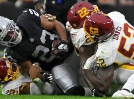 Las Vegas Raiders running back Kenyan Drake broke his ankle after three players from the Washington Football team tackled him at Allegiant Stadium in Las Vegas. (Image: Getty)