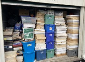 Ever wondered what a 10' x 10' stacked completely full of sports cards looks like? Now you know. (Image: Johnny Kampis)