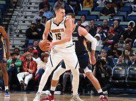 Nikola Jokic from the Denver Nuggets makes a move against center Jonas Valanciunas of the New Orleans Pelicans at the Smoothie King Center. (Image: Stephen Lew/USA Today Sports)