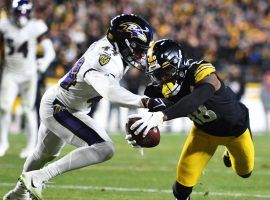 Baltimore Ravens cornerback Marlon Humphrey attempts to tackle Pittsburgh Steelers WR Diontae Johnson, but suffers an injury on the play. (Image: Joe Sargent/Getty)