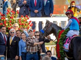 Jockey John Velazquez aboard Kentucky Derby champion Medina Spirit, with owner Amr Zedan (far left), trainer Bob Baffert (yellow tie) and the rest of the horse's connections. Zedan and Baffert's attorneys issueed a statement maintaining the horse's positive drug test was due to an ointment. (Image: Jamie Newell/TwinSpires)