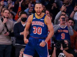 Steph Curry from the Golden State Warriors celebrates hitting a 3-point shot against the New York Knicks which clinched him the NBA record for most 3-pointers in a career. (Image: Vincent Carchietta/USA Today Sports)