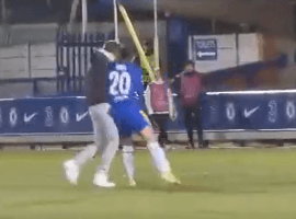 Sam Kerr knocked down a pitch invader in Chelsea's 0-0 draw against Juventus at Kingsmeadow. (Image: Twitter/bcoxy2012)