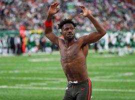 Tampa Bay Bucs WR Antonio Brown waves to the crowd after he removed his helmet, pads, and undershirt after a sideline disagreement during a game against the New York Jets at MetLife Stadium. (Image: Getty)