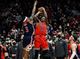 DeMar DeRozan from the Chicago Bulls attempts a game-winning buzzer beater over Bradley Beal of the Washington Wizards on New Yearâ€™s Day. (Image: Getty)