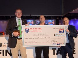 David Harrison (center) became the 23rd winner of the National Horseplayers Championship in the 23-year history of the event. Presenting the $725,000 first-price check are NTRA President Tom Rooney (left) and NTRA COO and NHC Tournament Director Keith Chamblin. (Image: NTRA)
