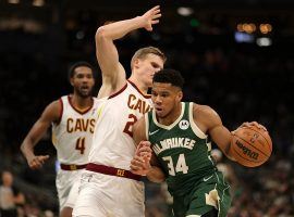 Milwaukee Bucks center Giannis 'Greek Freak' Antetokounmpo (34) drives to the basket against Lauri Markkanen (24) from the Cleveland Cavs. (Image: Stacey Revere/Getty)