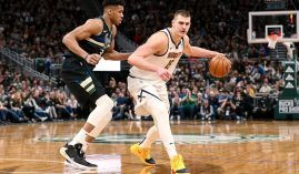 Giannis 'Greek Freak' Antetokounmpo from the Milwaukee Bucks defends Nikola Jokic of the Denver Nuggets at the Fiserv Arena in Milwaukee. (Image: Dylan Buell/Getty)
