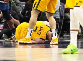 Joe Ingles from the Utah Jazz collapsed to the court after he suffered a knee injury against the Minnesota Timberwolves. (Image: David Berding/Getty)