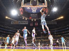Ja Morant from the Memphis Grizzlies soars for a dunk against the LA Lakers at Crypto.com Arena. (Image: Andrew D. Bernstein/Getty)