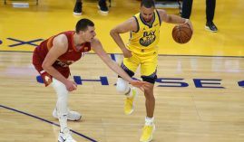 Reigning MVP Nikola Jokic from the Denver Nuggets guards Steph Curry of the Golden State Warriors. (Image: Jed Jacobsohn/AP)