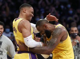 Russell Westbrook and LeBron James from the Los Angeles Lakers celebrate a win against the Utah Jazz at Crypto.com Arena to end a three-game losing streak. (Image: Ringo Chiu/AP)