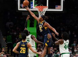 Myles Turner from the Indiana Pacers blocks a shot from Jaylen Brown of the Boston Celtics. (Image: Getty)