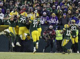 The offensive line from the Green Bay Packers celebrate a touchdown by Davante Adams against the Minnesota Vikings at Lambeau Field. (Image: Matt Ludtke/AP)