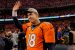 Peyton Manning waves after the Broncos AFC Championship victory over the New England Patriots.  (Image: Joe Amon/Getty)