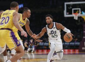 Donovan Mitchell from the Utah Jazz is defended by the Los Angeles Lakers at Crypto.com Arena on Monday night shortly before his head injury. (Image: Ringo HW Chiu/AP)