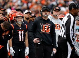 Cincinnati Bengals head coach Zac Taylor (center in black hoodie) on the sidelines in Week 16 against the Baltimore Ravens. (Image: Kirk Irwin/Getty)
