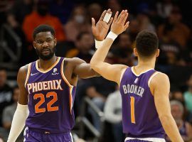 Deandre Ayton and Devin Booker congratulate each other after the Phoenix Suns won their last game prior to the All-Star Break. (Image: Christian Petersen/Getty)
